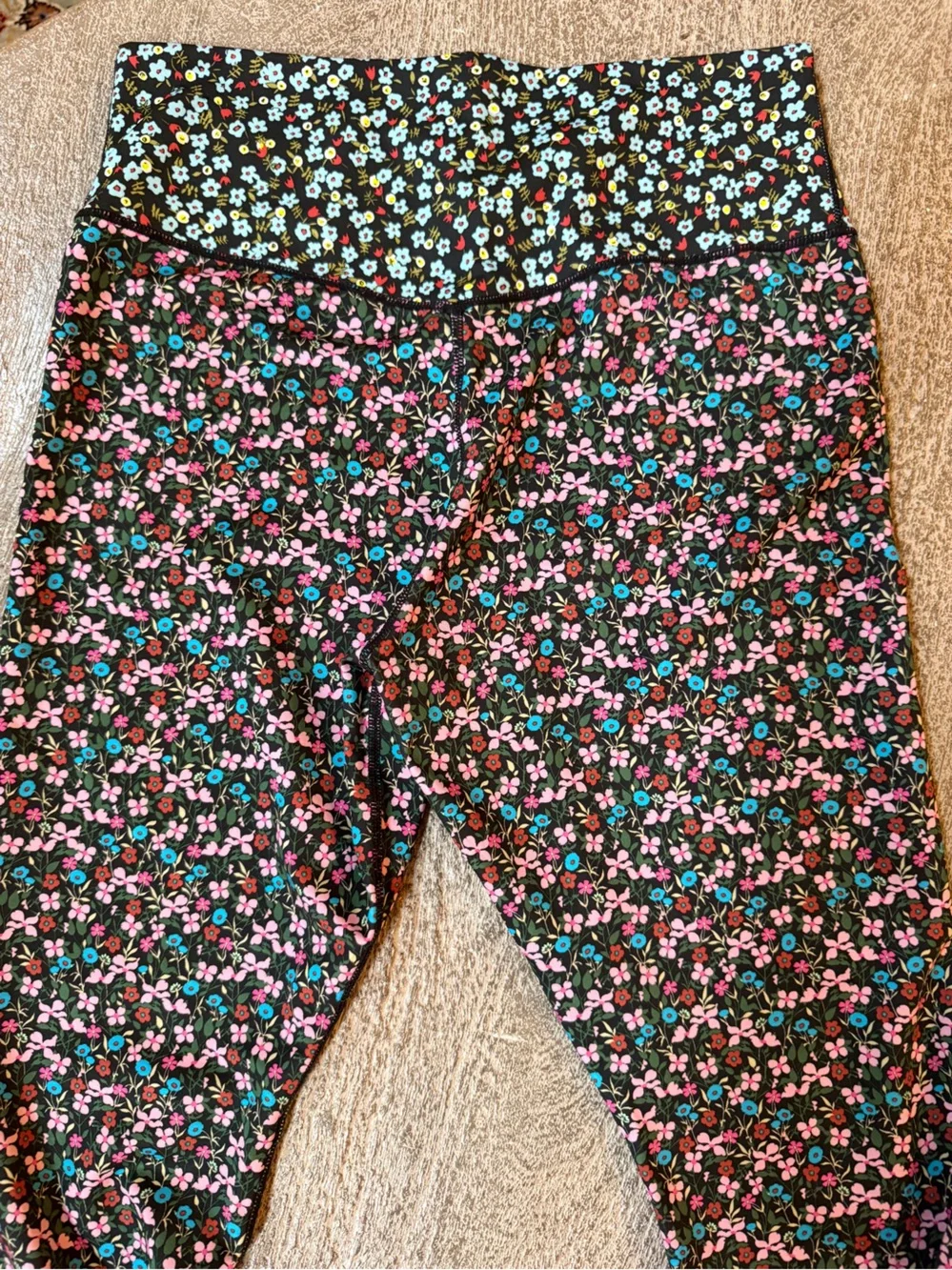 Nike Black Floral Leggings with Pink and Teal Accents